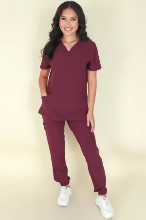 BACK AT IT SCRUB TOP
