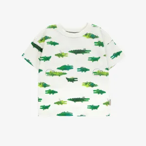 T-shirt ample blanc avec motif de crocodiles en jersey doux, bébé || Loose-fitting white t-shirt with crocodile all over print in soft jersey, baby